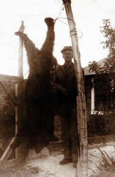 A.J. Fuchs and bear, 1947